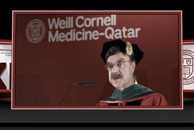 a man speaking at a podium