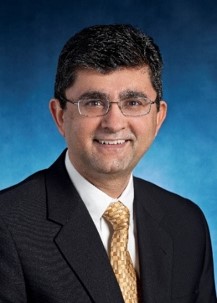 A headshot of Dr. Junaid Razzak